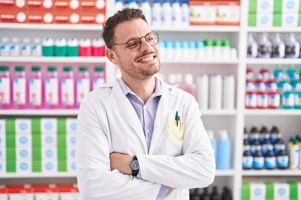 Young Hispanic Man Pharmacist Smiling Confident Standing Arms Crossed Gesture —  Fotos de Stock