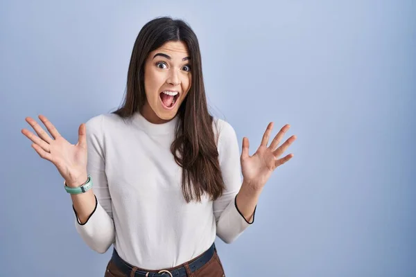 Young Brunette Woman Standing Blue Background Celebrating Crazy Amazed Success — 스톡 사진