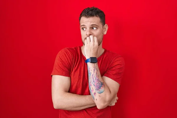 Young Hispanic Man Standing Red Background Looking Stressed Nervous Hands — Stock Photo, Image