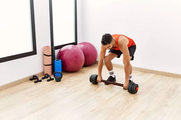 Young Arab Man Training Dumbbells Sport Center — Stockfoto