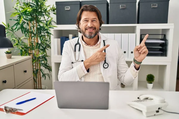 Handsome Middle Age Doctor Man Working Clinic Smiling Looking Camera — Stock Photo, Image