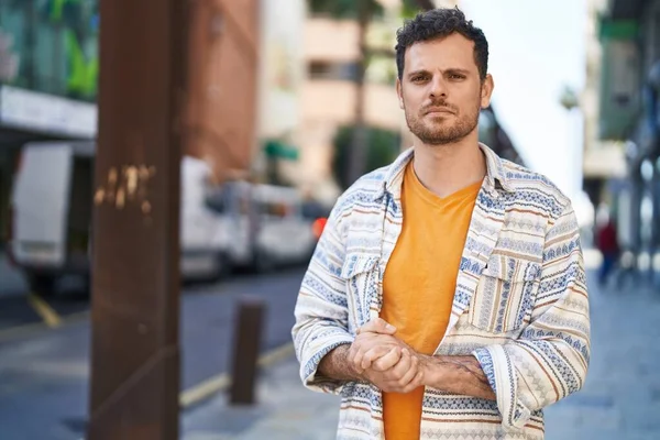 Young Hispanic Man Relaxed Expression Standing Street — Stockfoto