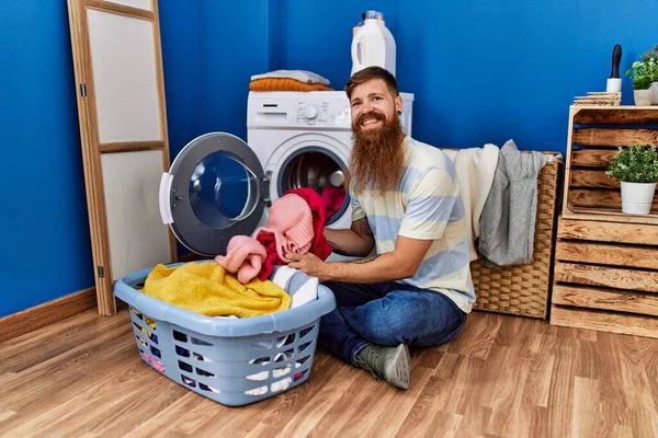 Young Redhead Man Smiling Confident Washing Clothes Laundry Room — Φωτογραφία Αρχείου