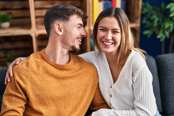 Young Man Woman Couple Hugging Each Other Sitting Sofa Home — Stock Photo, Image