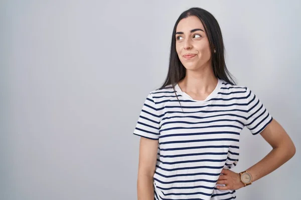 Young Brunette Woman Wearing Striped Shirt Smiling Looking Side Staring — Stock Photo, Image