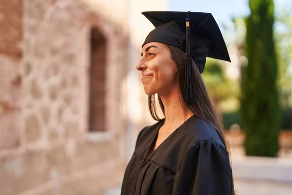 Young Hispanic Woman Wearing Graduated Uniform Standing University — Zdjęcie stockowe