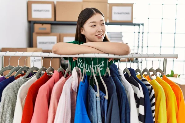 Young Asian Woman Smiling Donated Clothes Donations Stand — Fotografia de Stock