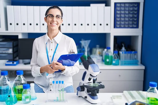Young Brunette Woman Working Scientist Laboratory Looking Away Side Smile — Stock Photo, Image