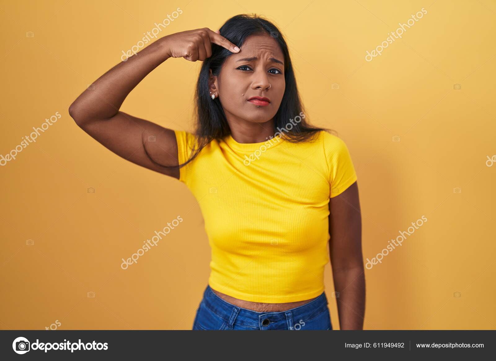 Young Indian Woman Standing Yellow Background Pointing Unhappy Pimple  Forehead Stock Photo by ©Krakenimages.com 611949492