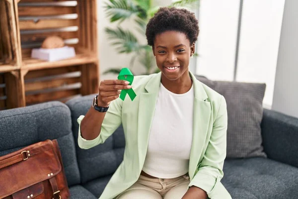 African American Woman Holding Support Green Ribbon Looking Positive Happy — Stock Photo, Image