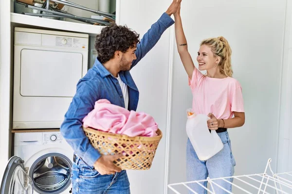 Young Couple Smiling Happy Holding Laundry Basket Detergent Bottle High — Stock Photo, Image