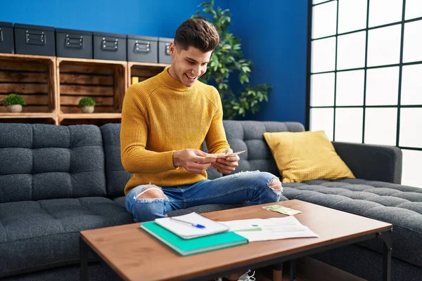 Young Hispanic Man Smiling Confident Counting Shekels Home — Stock Photo, Image