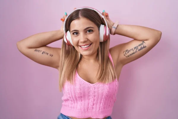 Young Blonde Woman Listening Music Using Headphones Posing Funny Crazy — Foto de Stock