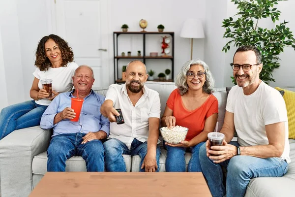 Group Middle Age Friends Smiling Happy Watching Film Home — Stock fotografie