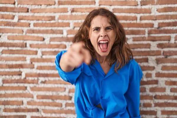 Beautiful Brunette Woman Standing Bricks Wall Pointing Displeased Frustrated Camera — Stock Photo, Image