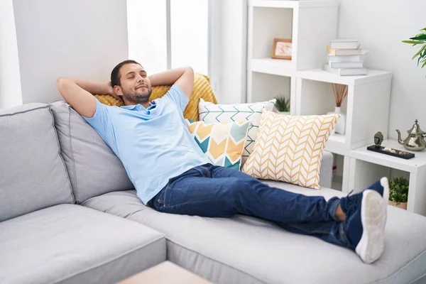 Young Man Relaxed Hands Head Sitting Sofa Home — Fotografia de Stock