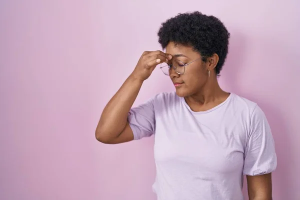 Young African American Woman Standing Pink Background Tired Rubbing Nose — Stock Photo, Image