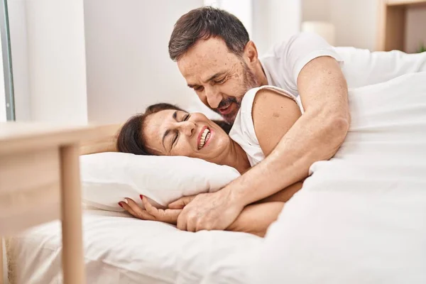 Middle Age Man Woman Couple Hugging Each Other Lying Bed — стоковое фото