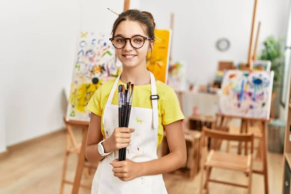 Adorable Girl Smiling Confident Holding Paintbrushes Art Studio — Photo