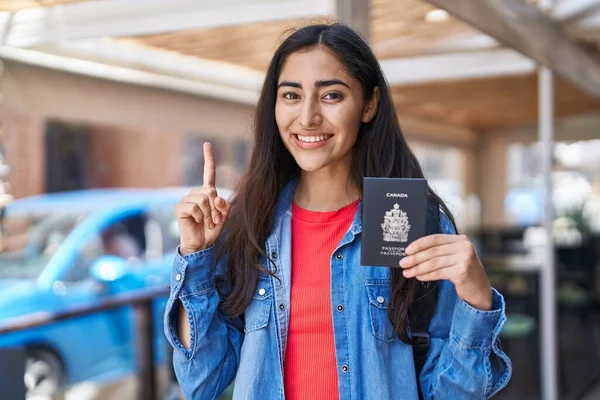 Young Teenager Girl Holding Canada Passport Smiling Idea Question Pointing — Foto Stock