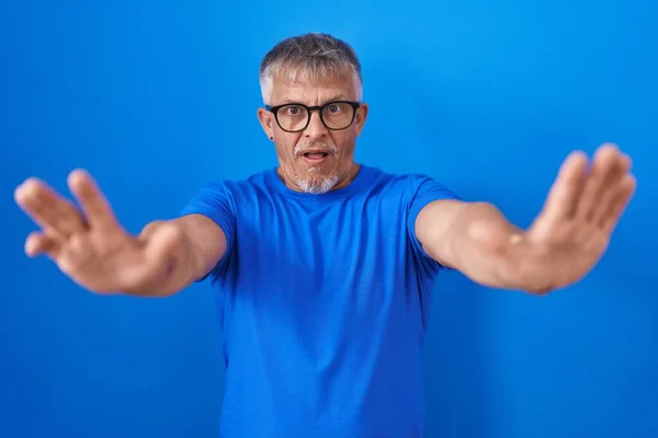 Hispanic Man Grey Hair Standing Blue Background Doing Stop Gesture — Stock Photo, Image