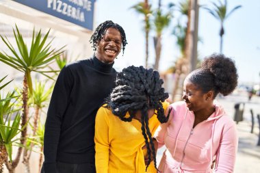 African american friends smiling confident standing together at street