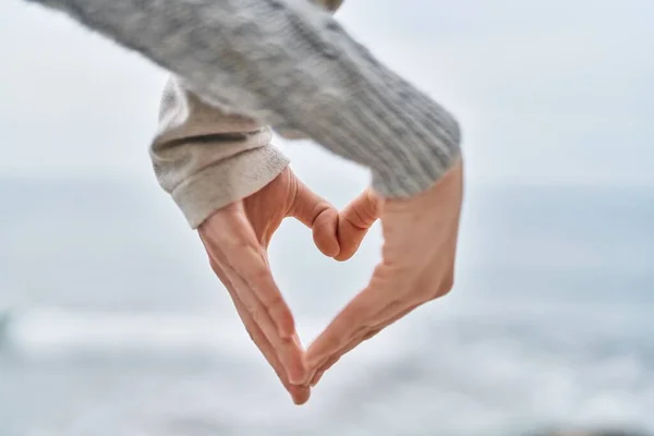 Man Woman Couple Doing Heart Gesture Hands Seaside — стоковое фото