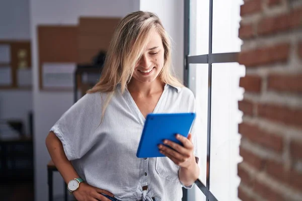 Young Blonde Woman Business Worker Smiling Confident Using Touchpad Office — Stok fotoğraf