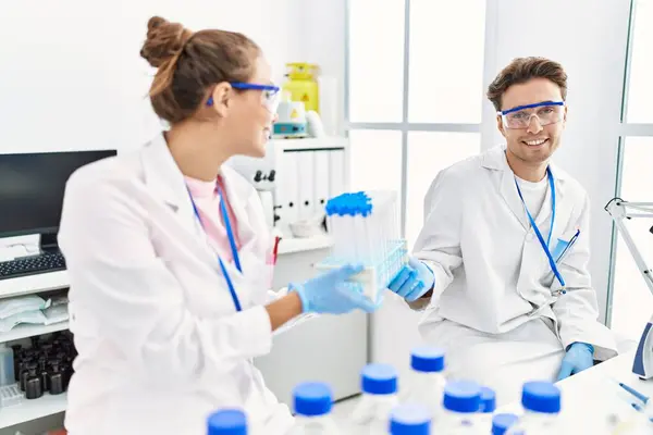Man Woman Wearing Scientist Uniform Holding Test Tube Laboratory — Fotografia de Stock