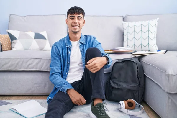 Young Hispanic Man Sitting Floor Studying University Happy Cool Smile — Foto de Stock