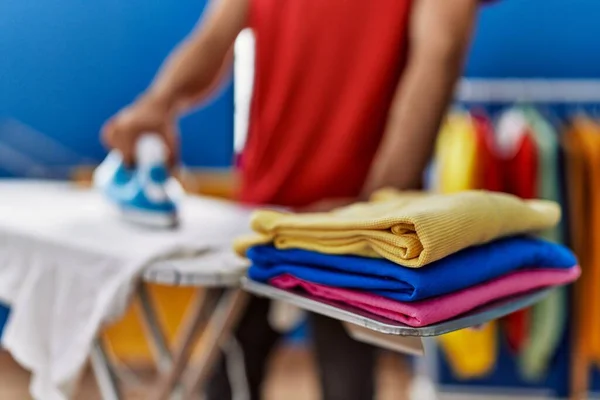 Young Hispanic Man Ironing Clothes Laundry Room — Stock fotografie