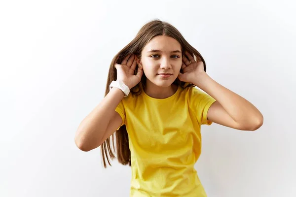 Young Brunette Teenager Standing Together Isolated Background Trying Hear Both — Stock Photo, Image