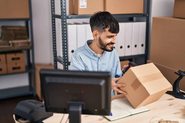 Young Hispanic Man Ecommerce Business Worker Scanning Package Office — Stockfoto