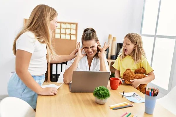 Mother and daughters business worker stressed for girls working at office