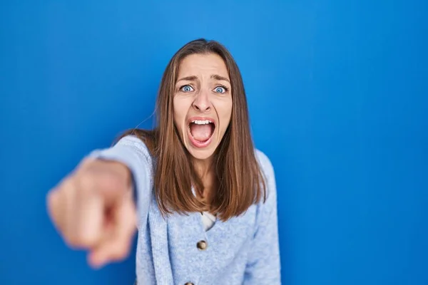 Young Woman Standing Blue Background Pointing Displeased Frustrated Camera Angry — ストック写真