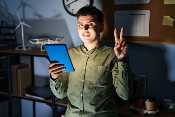 Non Binary Person Using Touchpad Device Night Smiling Happy Face — 图库照片