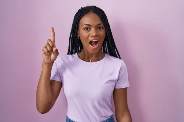 African American Woman Braids Standing Pink Background Pointing Finger Successful — Stockfoto
