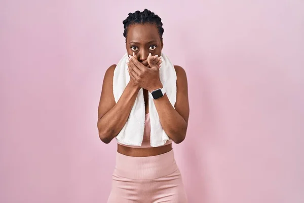 Beautiful Black Woman Wearing Sportswear Towel Pink Background Shocked Covering — Stock Photo, Image