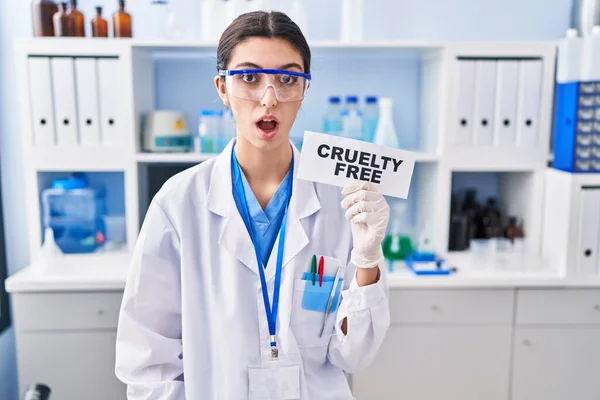 Young Beautiful Woman Working Cruelty Free Laboratory Scared Amazed Open — Fotografia de Stock