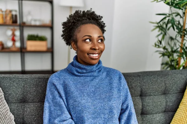 African American Woman Smiling Confident Sitting Sofa Home — Stockfoto