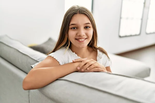 Adorable Girl Smiling Confident Sitting Sofa Home — Zdjęcie stockowe