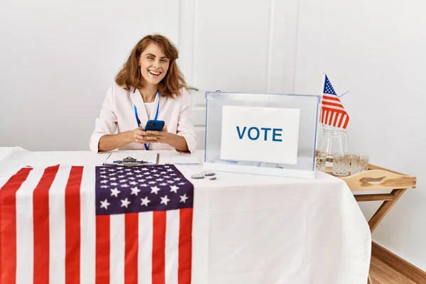 Young American Politic Party Worker Smiling Happy Using Smartphone Electoral — Stockfoto