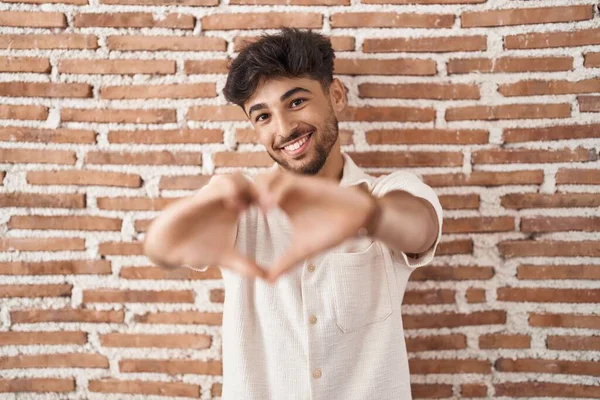 Arab Man Beard Standing Bricks Wall Background Smiling Love Doing — Foto Stock