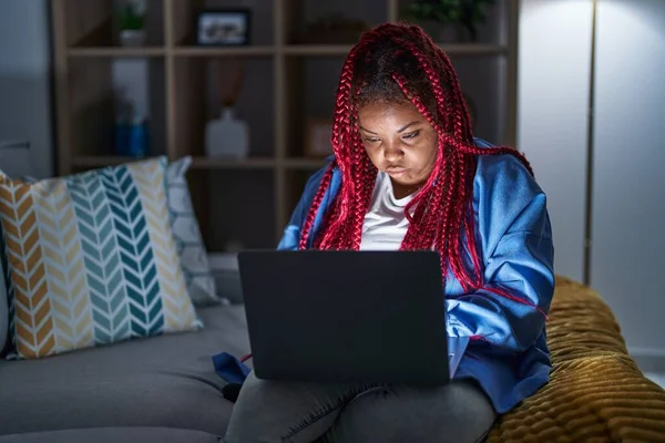 African American Woman Braided Hair Using Computer Laptop Night Looking —  Fotos de Stock