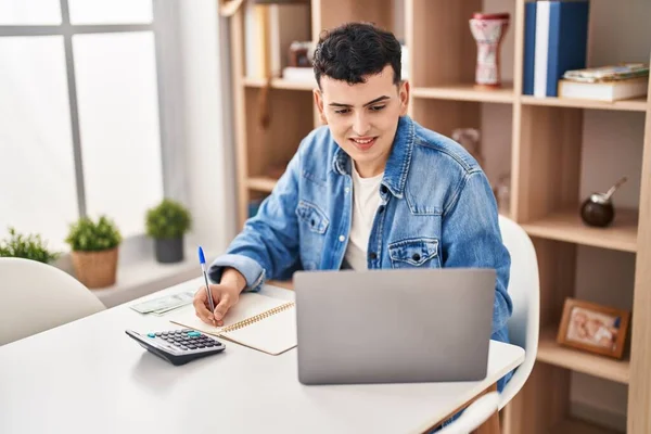 Young Non Binary Man Sitting Table Doing Accounting Home — Stockfoto