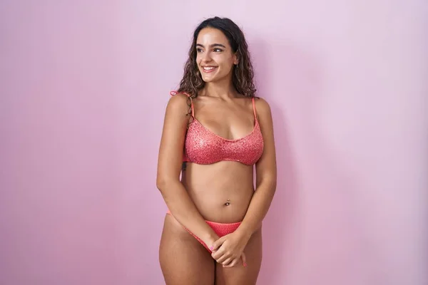Young Hispanic Woman Wearing Lingerie Pink Background Looking Away Side — Stock Photo, Image