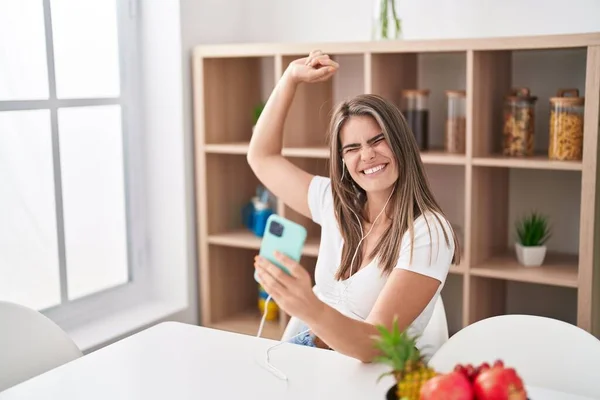 Young Woman Listening Music Sitting Table Home — Foto de Stock