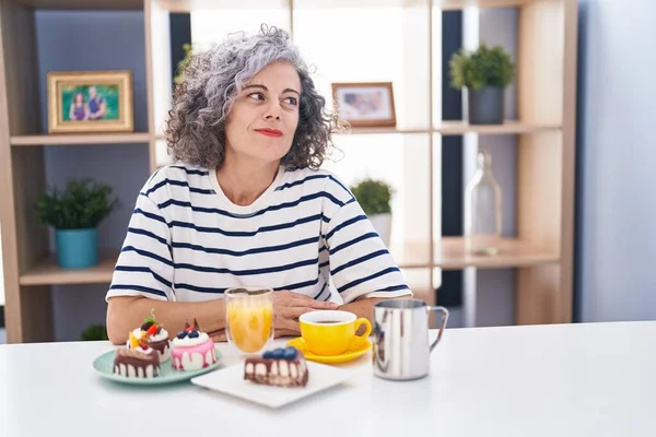 Middle Age Woman Grey Hair Eating Pastries Drinking Coffee Breakfast — Stock Photo, Image