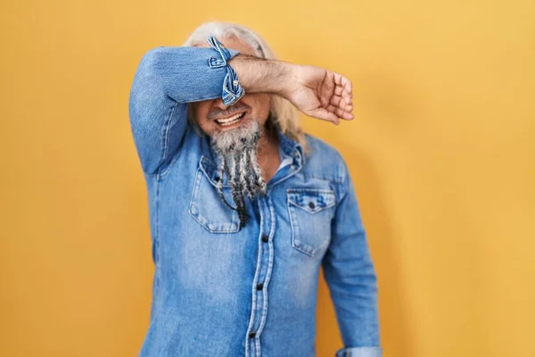 Middle Age Man Grey Hair Standing Yellow Background Covering Eyes — Stock fotografie