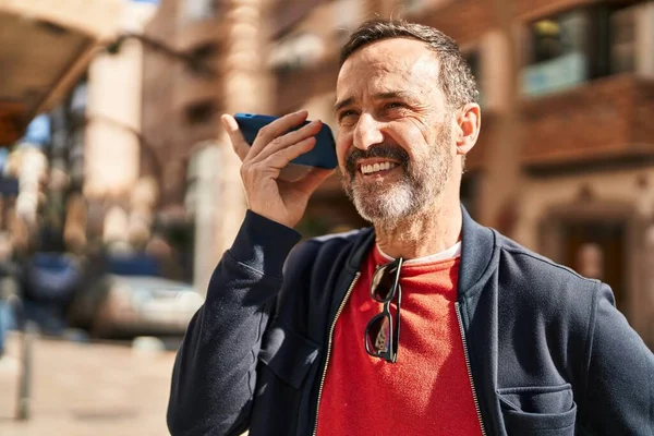 Middle Age Man Smiling Confident Listening Audio Message Smartphone Street — ストック写真
